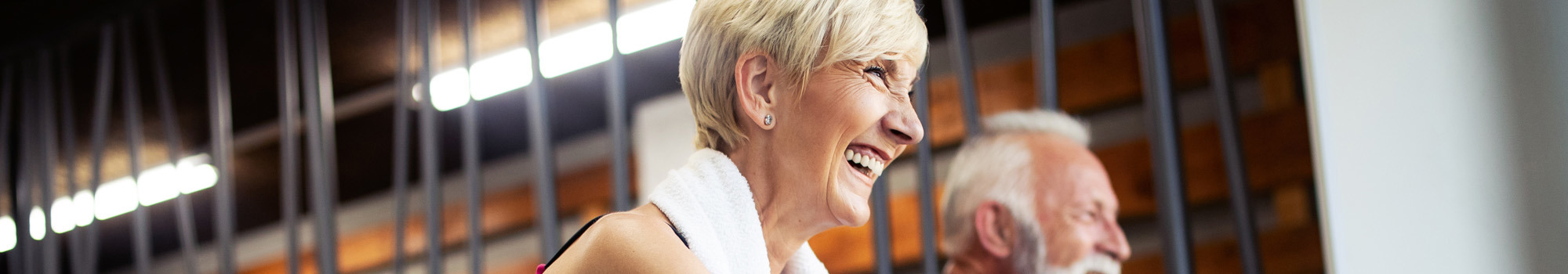 Couple On Exercise Bikes